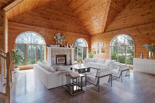 176 Saprae Crescent, Saprae Creek, AB - Indoor Photo Showing Living Room With Fireplace