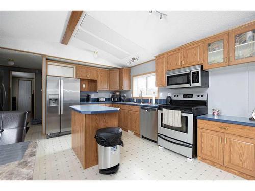 100 Grey Owl Place Sw, Fort Mcmurray, AB - Indoor Photo Showing Kitchen With Double Sink