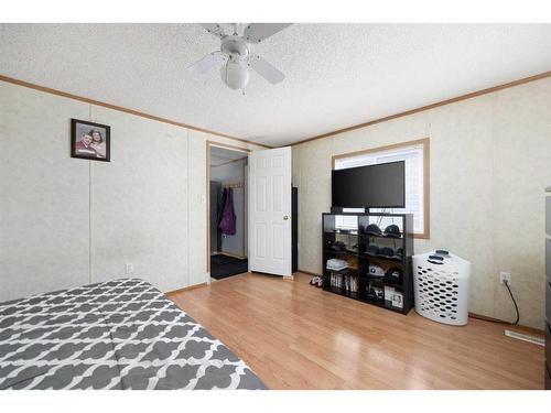 100 Grey Owl Place Sw, Fort Mcmurray, AB - Indoor Photo Showing Bedroom