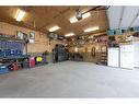 100 Grey Owl Place Sw, Fort Mcmurray, AB  - Indoor Photo Showing Garage 