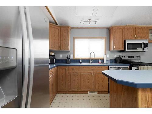 100 Grey Owl Place Sw, Fort Mcmurray, AB - Indoor Photo Showing Kitchen