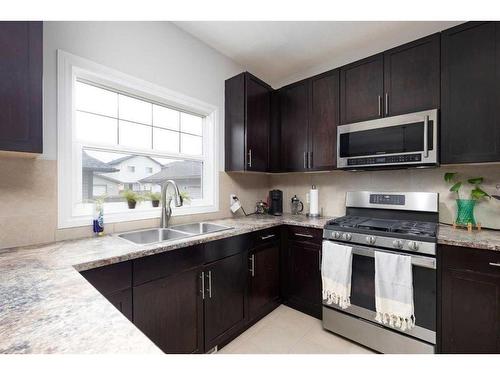 130 Merganser Crescent, Fort Mcmurray, AB - Indoor Photo Showing Kitchen With Double Sink