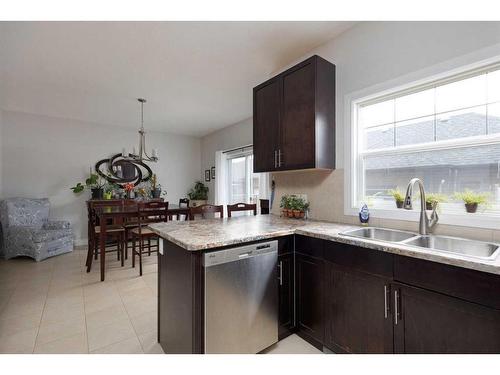 130 Merganser Crescent, Fort Mcmurray, AB - Indoor Photo Showing Kitchen With Double Sink
