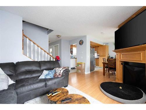 231 Athabasca Avenue, Fort Mcmurray, AB - Indoor Photo Showing Living Room With Fireplace