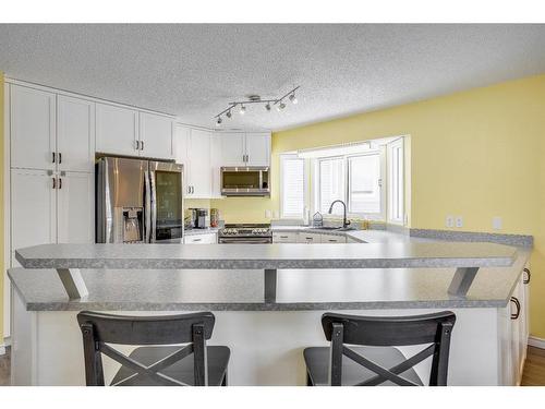 252 Torrie Crescent, Fort Mcmurray, AB - Indoor Photo Showing Kitchen With Stainless Steel Kitchen With Double Sink