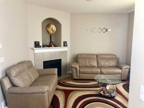 274 Thrush Street, Fort Mcmurray, AB - Indoor Photo Showing Living Room With Fireplace