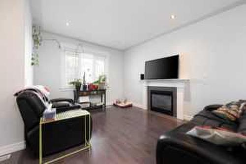 104 Collicott Drive, Fort Mcmurray, AB - Indoor Photo Showing Living Room With Fireplace