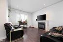 104 Collicott Drive, Fort Mcmurray, AB  - Indoor Photo Showing Living Room With Fireplace 