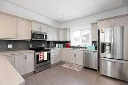 104 Collicott Drive, Fort Mcmurray, AB - Indoor Photo Showing Kitchen With Stainless Steel Kitchen