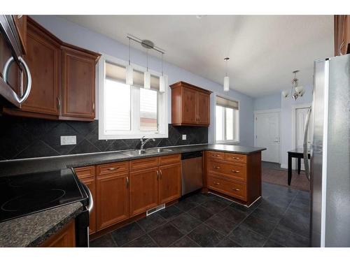 292 Swallow Way, Fort Mcmurray, AB - Indoor Photo Showing Kitchen With Double Sink