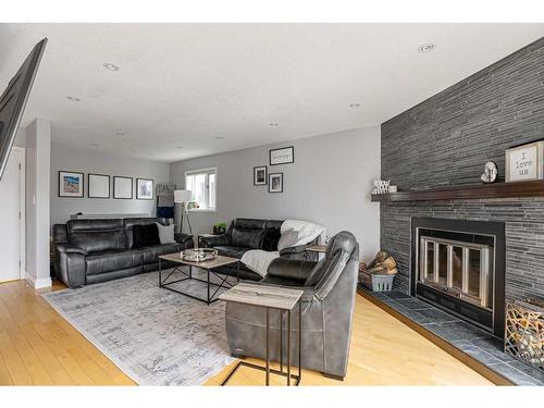 269 Ball Place, Fort Mcmurray, AB - Indoor Photo Showing Living Room With Fireplace