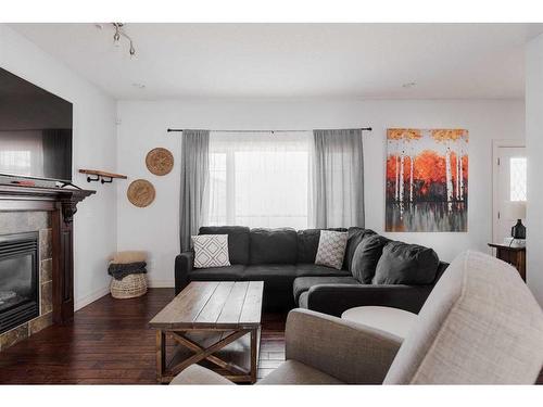 161 Snowy Owl Way, Fort Mcmurray, AB - Indoor Photo Showing Living Room With Fireplace