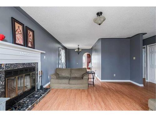 248 Bacon Place, Fort Mcmurray, AB - Indoor Photo Showing Living Room With Fireplace