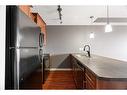 2401-204 Sparrow Hawk Drive, Fort Mcmurray, AB  - Indoor Photo Showing Kitchen With Double Sink 