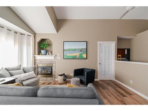 105 Laffont Place, Fort Mcmurray, AB - Indoor Photo Showing Living Room With Fireplace