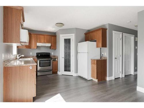 393 Diefenbaker Drive, Fort Mcmurray, AB - Indoor Photo Showing Kitchen With Double Sink
