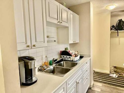 106-13221 Macdonald Drive, Fort Mcmurray, AB - Indoor Photo Showing Kitchen With Double Sink