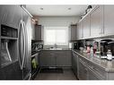 143 Merganser Crescent, Fort Mcmurray, AB  - Indoor Photo Showing Kitchen With Double Sink 