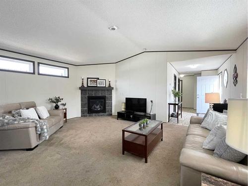 145 Caouette Crescent, Fort Mcmurray, AB - Indoor Photo Showing Living Room With Fireplace