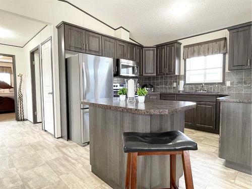 145 Caouette Crescent, Fort Mcmurray, AB - Indoor Photo Showing Kitchen