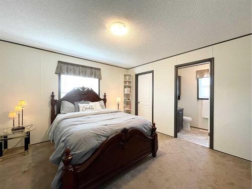 145 Caouette Crescent, Fort Mcmurray, AB - Indoor Photo Showing Bedroom