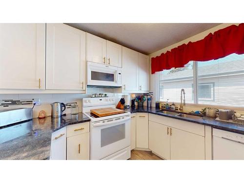 108 Hill Drive, Fort Mcmurray, AB - Indoor Photo Showing Kitchen With Double Sink