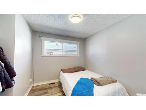 108 Hill Drive, Fort Mcmurray, AB - Indoor Photo Showing Bedroom