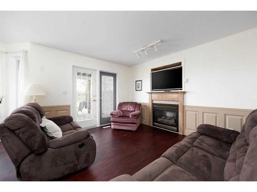 410 Athabasca Avenue, Fort Mcmurray, AB - Indoor Photo Showing Living Room With Fireplace