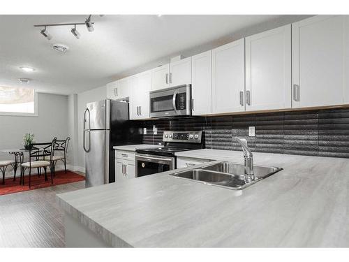 160 Chalifour Street, Fort Mcmurray, AB - Indoor Photo Showing Kitchen With Stainless Steel Kitchen With Double Sink