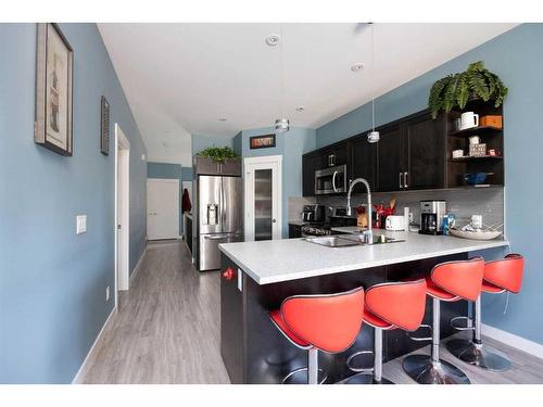 224 J.W. Mann Drive, Fort Mcmurray, AB - Indoor Photo Showing Kitchen With Stainless Steel Kitchen With Double Sink