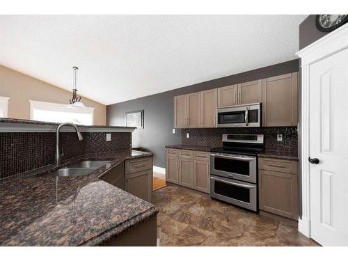 145 Boisvert Place, Fort Mcmurray, AB - Indoor Photo Showing Kitchen With Double Sink