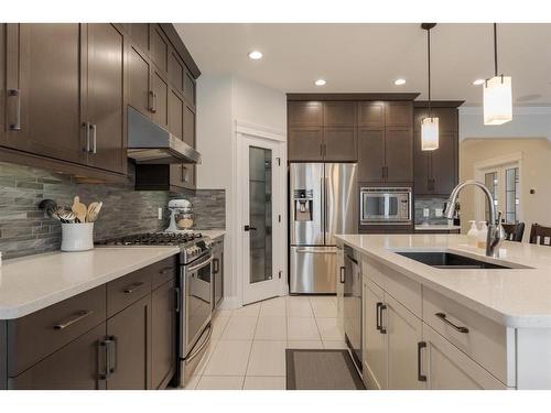 122 Comfort Cove, Fort Mcmurray, AB - Indoor Photo Showing Kitchen With Upgraded Kitchen