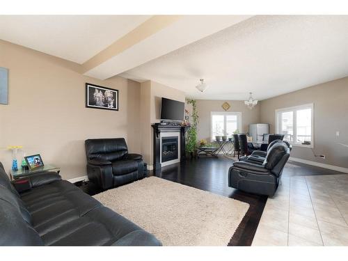 577 Heritage Drive, Fort Mcmurray, AB - Indoor Photo Showing Living Room With Fireplace