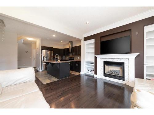 137 Shalestone Way, Fort Mcmurray, AB - Indoor Photo Showing Living Room With Fireplace