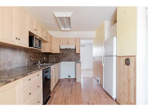 154 Bird Crescent, Fort Mcmurray, AB - Indoor Photo Showing Kitchen With Double Sink