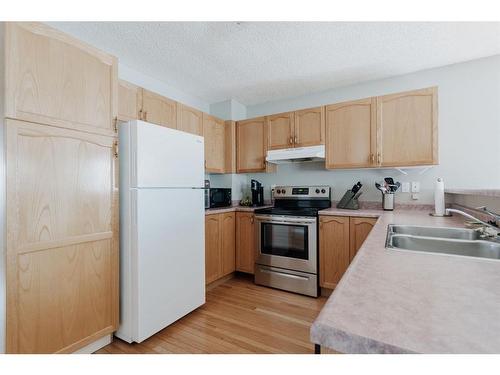 221 Sitka Drive, Fort Mcmurray, AB - Indoor Photo Showing Kitchen With Double Sink