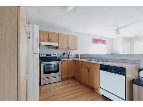 221 Sitka Drive, Fort Mcmurray, AB - Indoor Photo Showing Kitchen With Double Sink