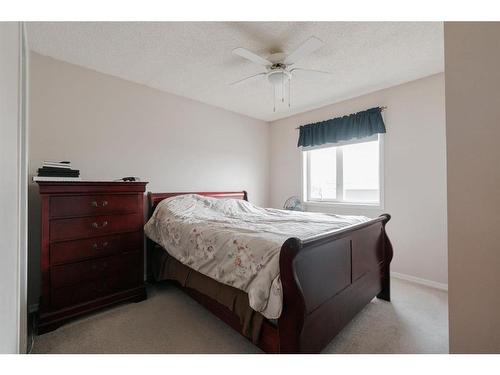 221 Sitka Drive, Fort Mcmurray, AB - Indoor Photo Showing Bedroom
