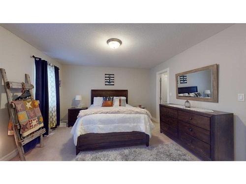128 Saline Creek Way, Fort Mcmurray, AB - Indoor Photo Showing Bedroom