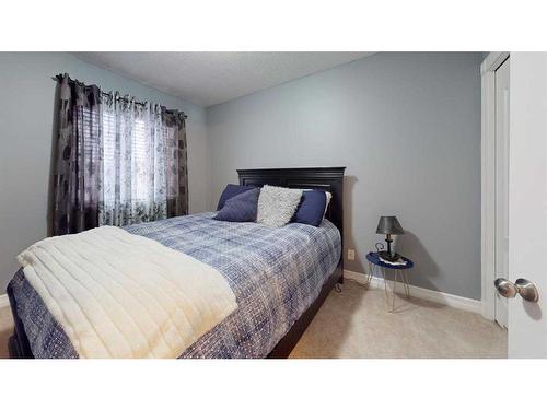 128 Saline Creek Way, Fort Mcmurray, AB - Indoor Photo Showing Bedroom