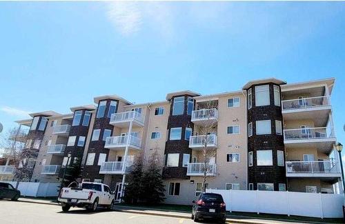 203-10220 101 Street, Lac La Biche, AB - Outdoor With Balcony With Facade