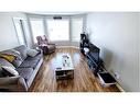 203-10220 101 Street, Lac La Biche, AB  - Indoor Photo Showing Living Room 