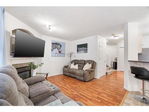 153 Cinnamon Street, Fort Mcmurray, AB - Indoor Photo Showing Living Room With Fireplace