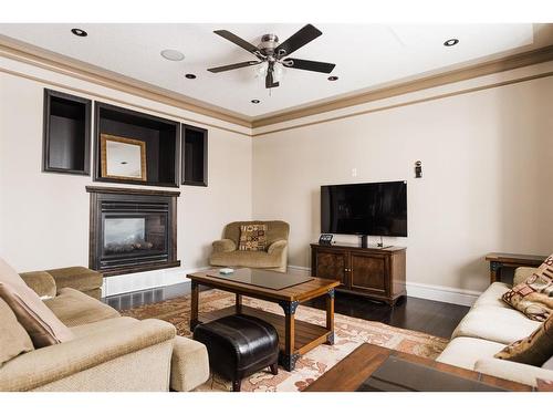 145 Stonecreek Landing, Fort Mcmurray, AB - Indoor Photo Showing Living Room With Fireplace