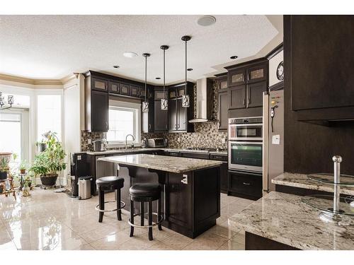 145 Stonecreek Landing, Fort Mcmurray, AB - Indoor Photo Showing Kitchen With Upgraded Kitchen