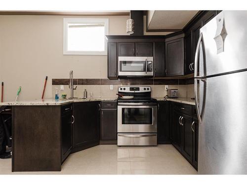 145 Stonecreek Landing, Fort Mcmurray, AB - Indoor Photo Showing Kitchen