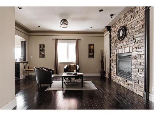 145 Stonecreek Landing, Fort Mcmurray, AB - Indoor Photo Showing Living Room With Fireplace