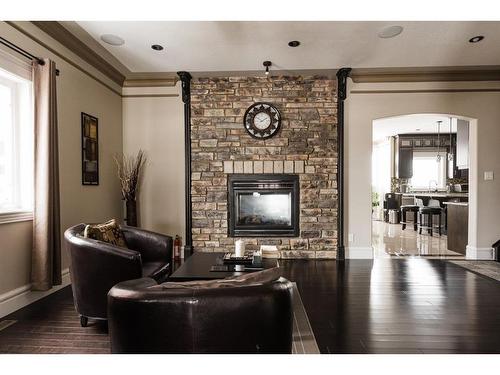 145 Stonecreek Landing, Fort Mcmurray, AB - Indoor Photo Showing Living Room With Fireplace