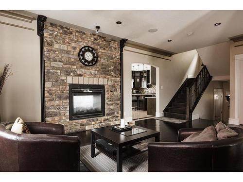 145 Stonecreek Landing, Fort Mcmurray, AB - Indoor Photo Showing Living Room With Fireplace