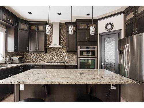 145 Stonecreek Landing, Fort Mcmurray, AB - Indoor Photo Showing Kitchen With Upgraded Kitchen